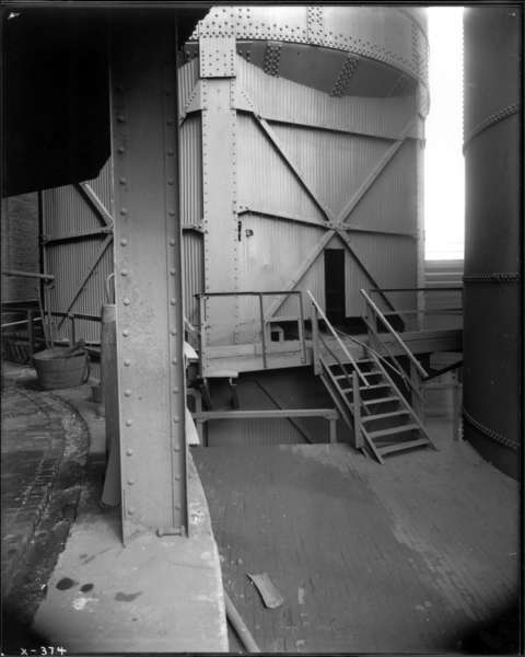 Blast Furnace View Looking East Toward West Side of #6 Blast Furnace Dust Catcher, Showing Position Where Man Operates Dust Catcher Valve