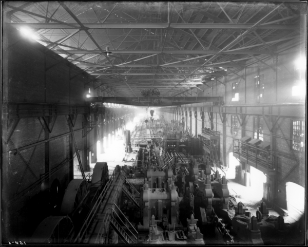 Rail Mill. View from West Track of Pit Crane Looking West at Interior of Mill