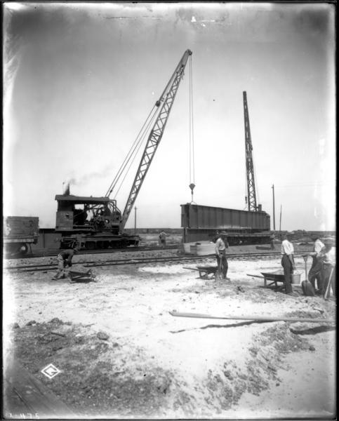 Slab Mill. Two Low Cranes Lifting 25 Ton Girdles